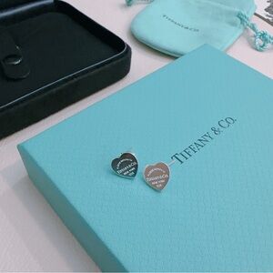Tiffany & Co. Sterling Silver Heart Stud Earrings on Tiffany Blue